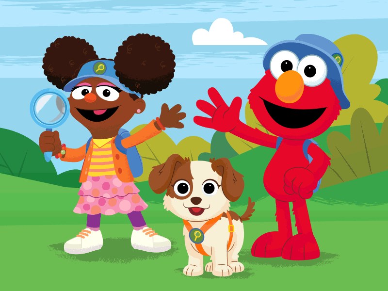 Colorful scene from Sesame Street Nature Explorers with Elmo and Big Bird exploring nature