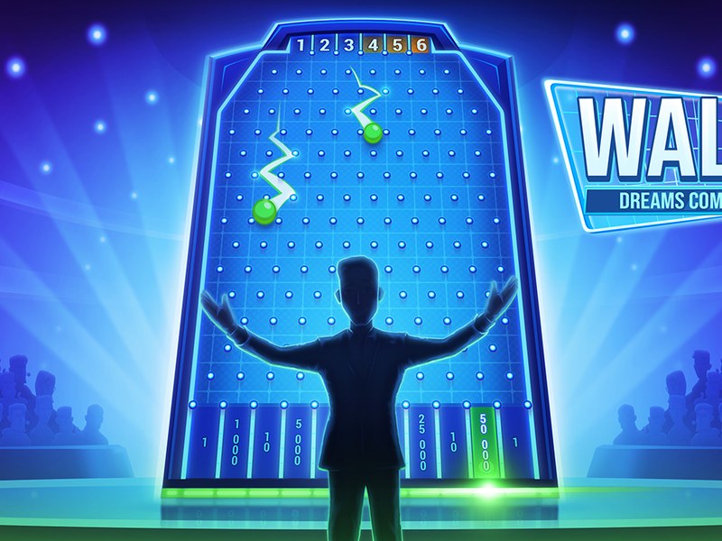Exciting scene from The Wall quiz game with colorful balls and prizes